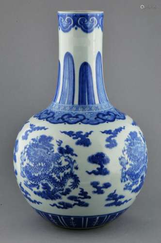 Porcelain vase. China. Kuang Hsu mark and possibly of the period. Underglaze blue decoration of dragons, pearls and clouds. 17