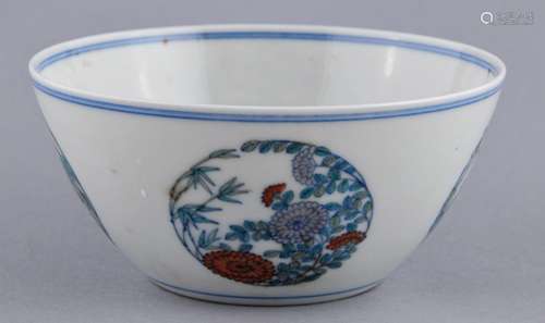 Porcelain bowl. China. Early 20th century. Tou Tsai decoration of floral roundels. Yung Cheng mark. 5-1/2