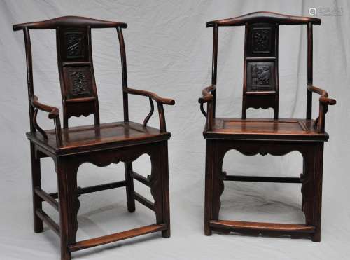 Pair of Yoke Backed arm chairs. China. 19th century. Elmwood. Carved back splats. 17-1/2