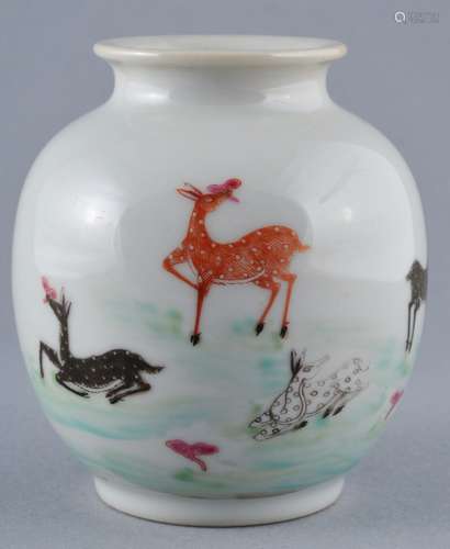 Porcelain vase. China. Early 20th century. Oviform. Famille Rose decoration of deer and Ling Chih. Ch'ien Lung mark. 3-1/4