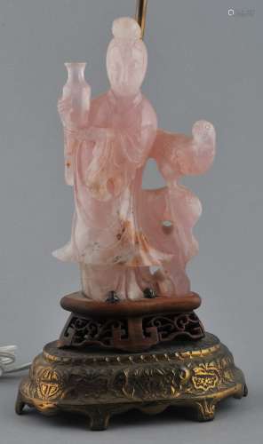 Rose Quartz carving. China. 19th century. Figure of a Goddess holding a vase with a hawk nearby. 9