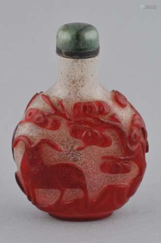 Snuff bottle. China. 19th century. Cameo glass red cut to snowflake. Decoration of deer and a pine tree. 3