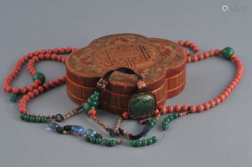Court necklace. China. Early 20th century. Coral and Jade green glass. Straw work quatrefoil box.