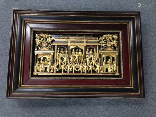 Carved framed wooden panel, China. First half of 20th century. Patriotic scene of figures in a pavilion. Carved in high relief. Surface with red and black lacquer and gilt. 41