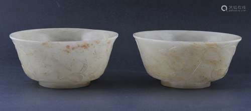 Pair of Jade bowls. China. 19th century. Grey coloured stone. Surface carved with geese and aquatic grasses. 5-1/2