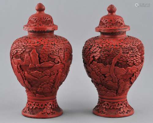 Pair of covered jars. China. Early 20th century. Carved Cinnabar lacquer. Losses. 8