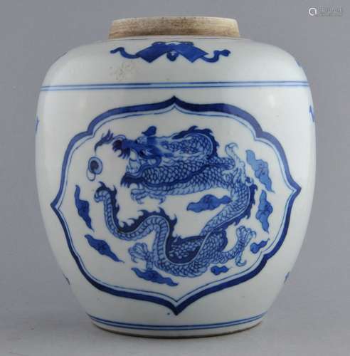 Porcelain jar. China. 19th century. Oviform shape. Underglaze blue decoration of a dragon and a phoenix with clouds and auspicious emblems. 6-1/2