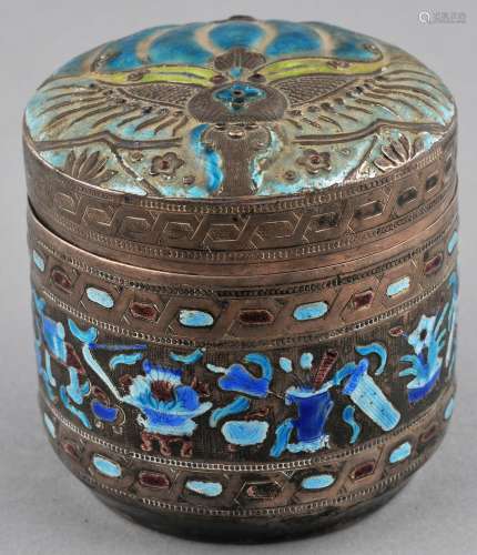 Enameled Silver Box over porcelain. China. Early 20th century. Decoration of a butterfly and melon and The Hundred Antiques. Porcelain lined. 3-1/4
