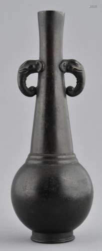 Bronze vase. China. Ming period. (1368-1644). Brush shaped with elephant handles. 8-1/4