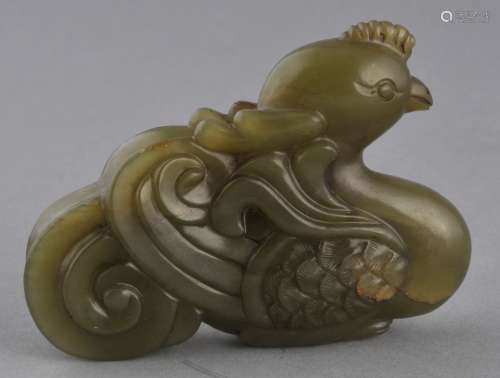 Jade carving. China. 19th century. Yellow green stone. Carving of a phoenix. 3