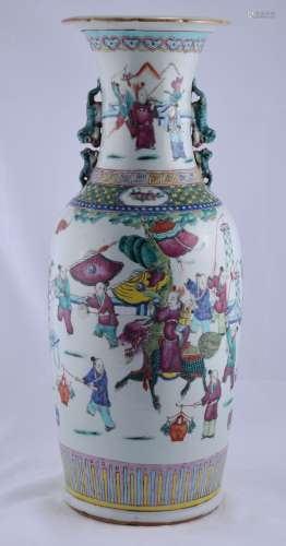Porcelain vase. China. 19th century. Foo Dog handles. Scalloped top. Famille Rose decoration of children playing. (Old stapled repairs). 24