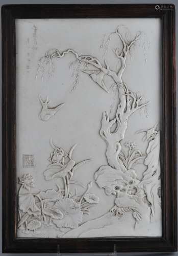 Porcelain plaque. China. Early 20th century. White glaze. Surface decorated with birds and flowers. 14-1/2