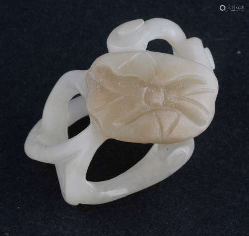 Jade carving. China. 20th century. Grey white stone. Carving of a lotus plant. 1-1/2