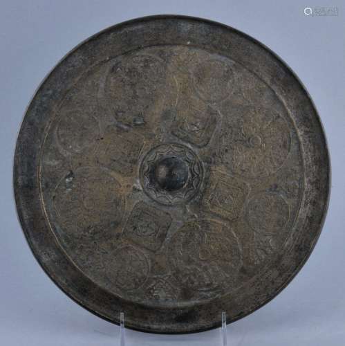 Bronze mirror. China. 18th century. Cast decoration of auspicioius emblems. 11-3/4