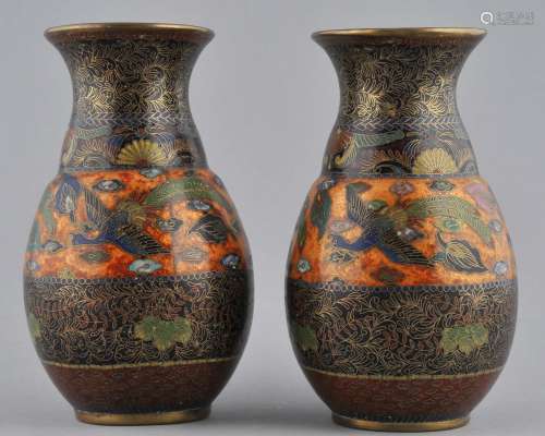 Pair of Cloisonné vases. Japan. Meiji period (1868-1912). Decoration of peacocks on a goldstone ground with floral scrolled borders. 5-3/4