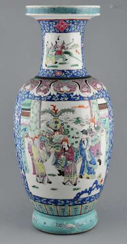 Large porcelain vase. China. Early 20th century. Famille Rose reserves of children and historical scene of a cobalt ground with lotus scrolling. 22