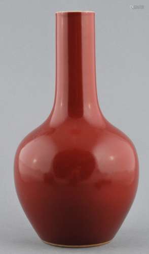 Porcelain vase. China. 19th century. Bottle form. Copper red glaze. 10-1/2
