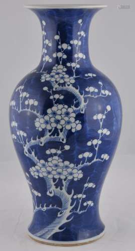 Porcelain vase. China. Early 20th century. Underglaze blue decoration of a  flowering prunus tree. Baluster form. 17