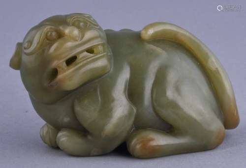 Jade carving. China. 19th century. Yellow green stone. Carving of a lion. 4