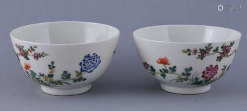 Pair of porcelain bowls. China. Hsien Feng mark (1851-1862) and period. Famille Rose decoration of birds, butterflies and flowers. 3-3/4