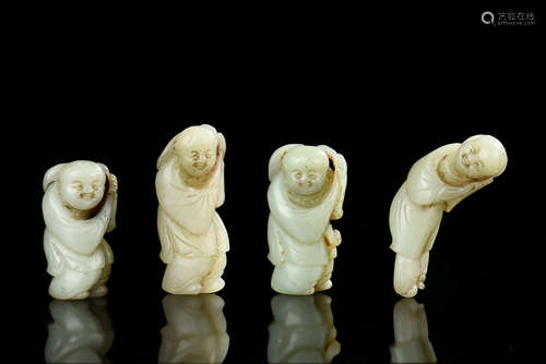 SET OF FOUR JADE CARVED FIGURES