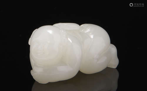 CARVED WHITE JADE BOY ORNAMENT