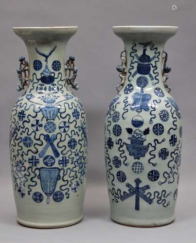 Pair of porcelain vases. China. Late 19th/Early 20th century. Underglaze blue decoration of the Emblems of the Immortals and Brocade spheres. 23