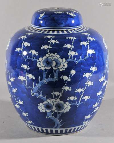 Porcelain covered jar. China. 19th century. Underglaze blue decoration of flowering prunus on a cracked ice ground. 11