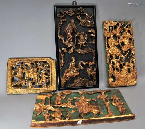 Lot of four Architectural elements. China. 19th century. Carved and pierced with figures in garden scenes. Surface with red and black lacquer and gilt. Largest- 18