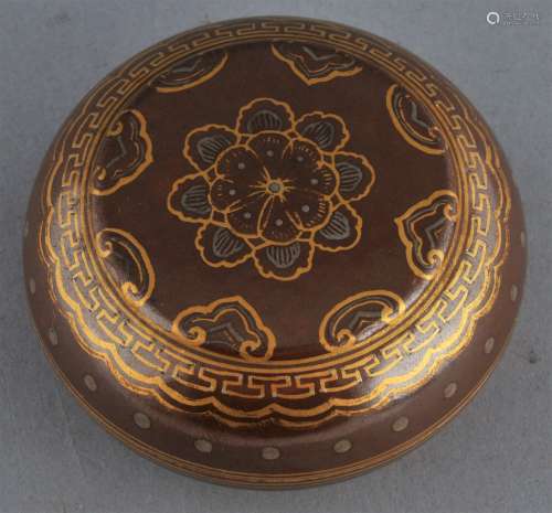 Porcelain Incense box. China. 19th century. Cafe au lait glaze with gilt decoration. Ch'ien Lung mark. 2-1/2