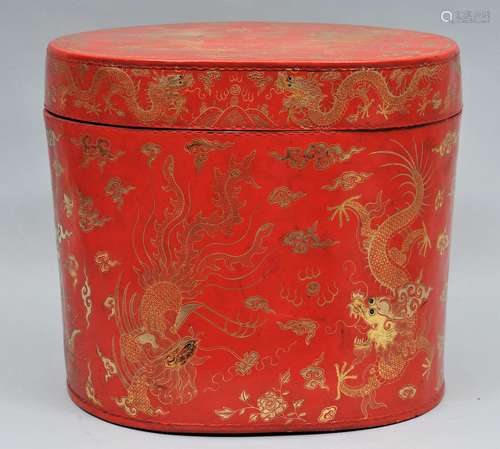 Early 20th century red lacquered leather oval hat box with gilt dragon decoration.  China. Original label inside cover. 14-1/2