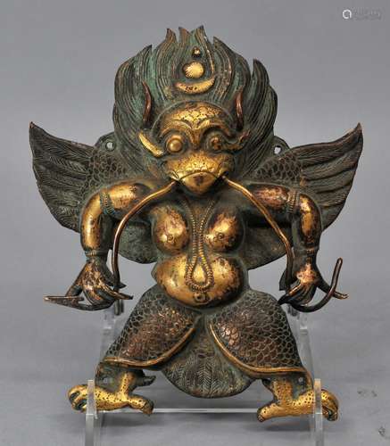 Gilt repousse plaque. Tibet. 19th century or earlier. Figure of Garuda. 7