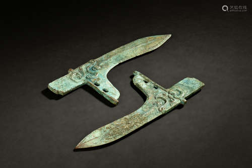 TWO ARCHAIC BRONZE DAGGER-AXE TIPS, GE