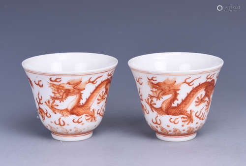 PAIR OF RED GLAZED 'DRAGON' CUPS