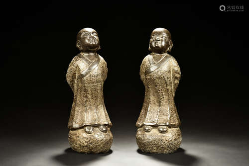 PAIR OF STONE CARVED YOUNG BOY MONKS