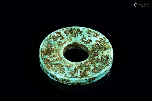 TURQUOISE CARVED DISC ORNAMENT