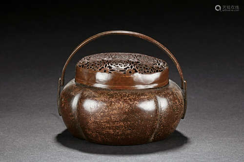 ZHANG MINGQI: BRONZE HAND WARMER WITH HANDLE