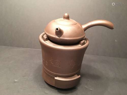 A Fine Chinese Zisha teapot on a Furnace, 5 1/2