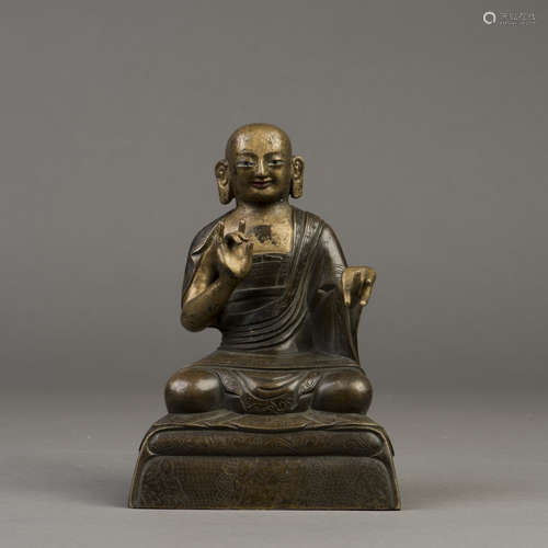 A GILT BRONZE SCULPTURE OF BUDDHA