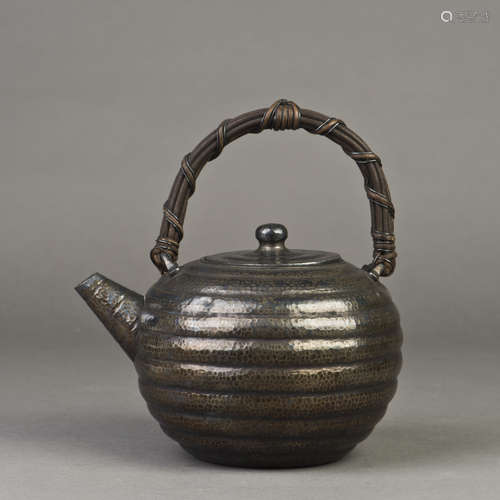 A JAPANESE SILVER TEAPOT