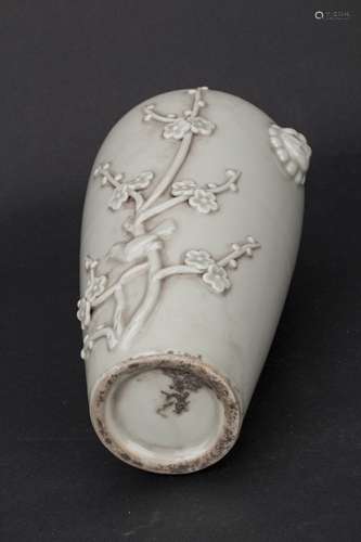 A RELIEF PATTERN WHITE PORCELAIN PLUM VASE