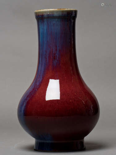 A MOTTLE-GLAZED GLOBULAR PORCELAIN VASE