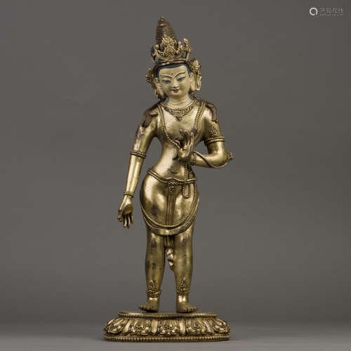 A GILT BRONZE SCULPTURE OF TARA