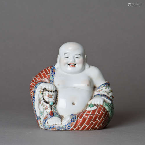 A FAMILLE ROSE PORCELAIN BUDDHA