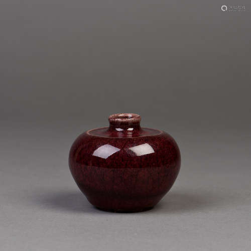 A CHINESE PORCELAIN ZUN WITH MOTTLED CRIMSON GLAZE