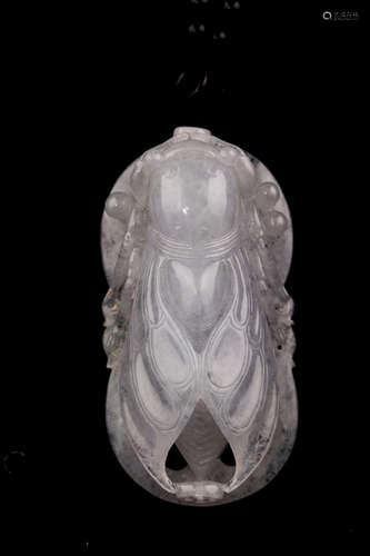 A TRANSLUCENT JADEITE PENDANT WITH GIA CERTIFICATE