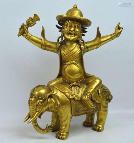 Large Tibetan Gilt Bronze Figure on Elephant