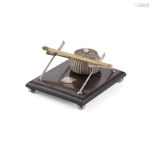 HUANGHUALI TROPHY IN THE SHAPE OF AN INKWELL AND PEN-REST QING DYNASTY, 19TH CENTURY 17cm long