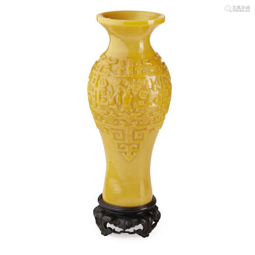 YELLOW GLASS 'PRECIOUS ANTIQUES' VASE JIAQING MARK AND OF THE PERIOD 21cm high (excluding stand)