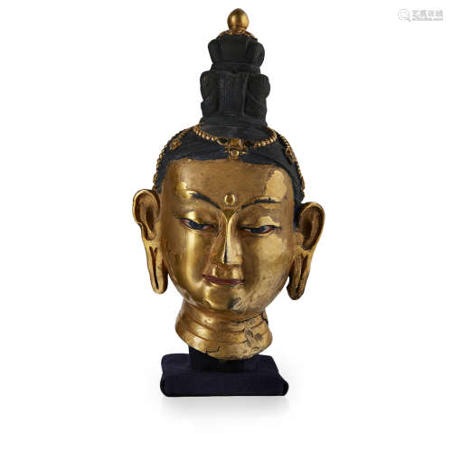 GILT-BRONZE HEAD OF A BODHISATTVA SINO-TIBETAN, 17TH/18TH CENTURY 17cm high